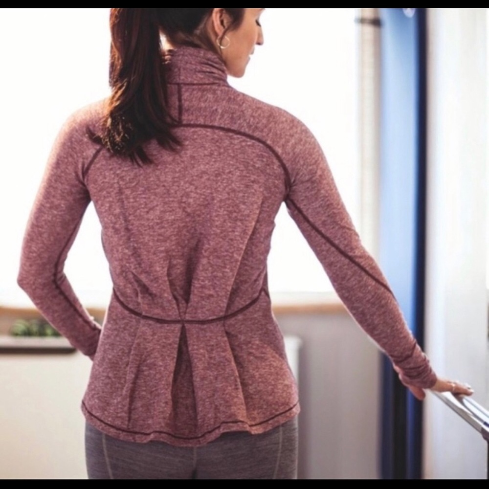 Ruffled back peplum top!